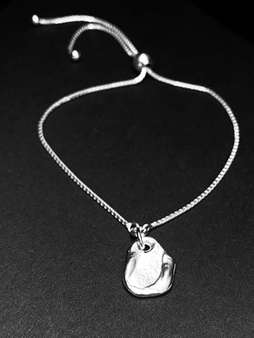 Silver msasa seed slider bracelet